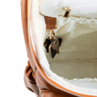 Florence nappy backpack - tan faux leather with key clip inside the spacious nappy bag.