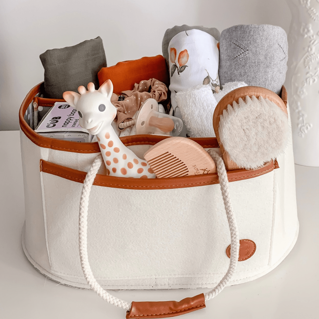 Neutral colour nappy caddy packed with newborn essentials - bambino bagz aria caddy 