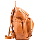 Florence vegan leather nappy backpack - side view. Insulated elasticated side pocket for your drink bottle. 