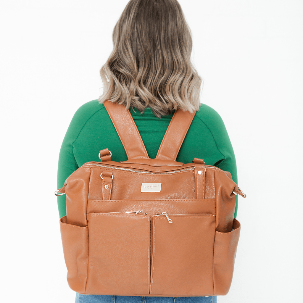 The back of the Bambino Bagz Sofia nappy bag in Tan faux leather worn as a nappy backpack 