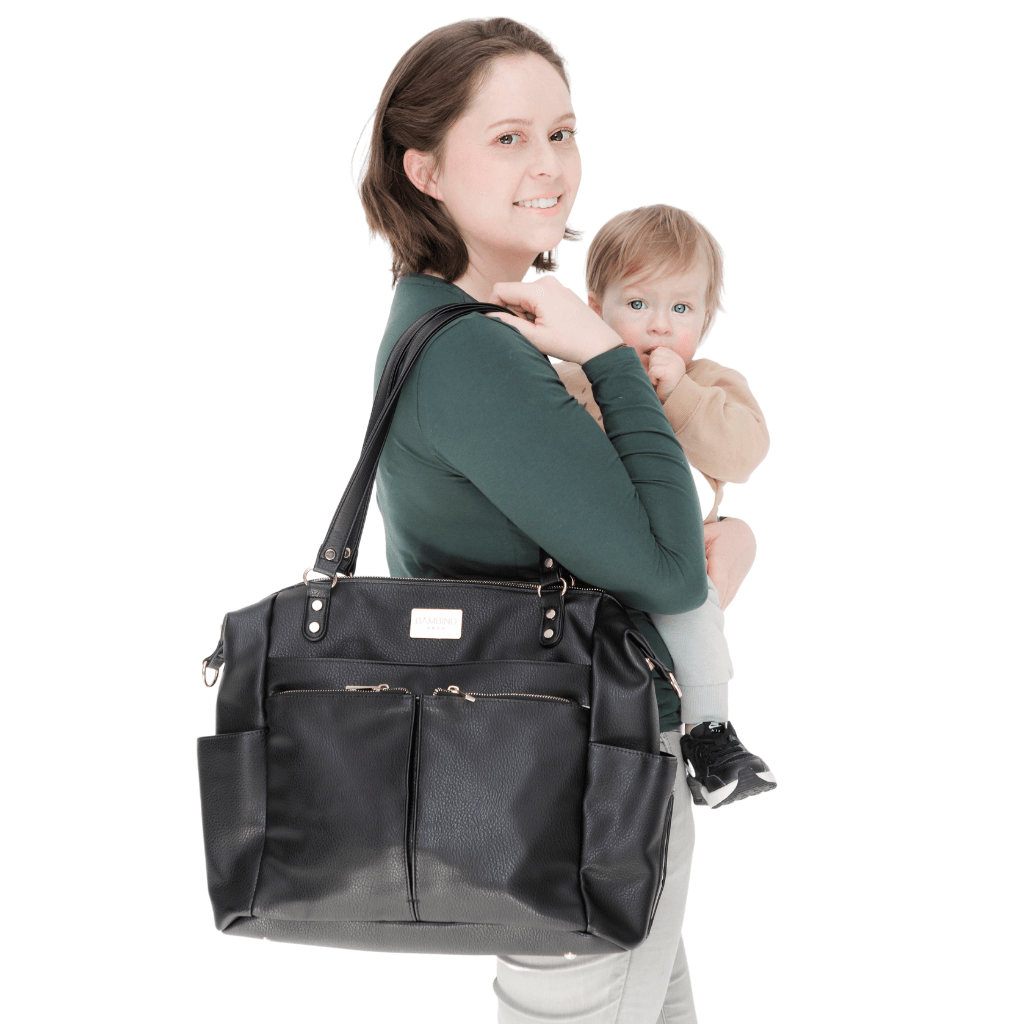 Convertible baby bag by bambino bagz. Sofia nappy bag in black worn over the shoulder